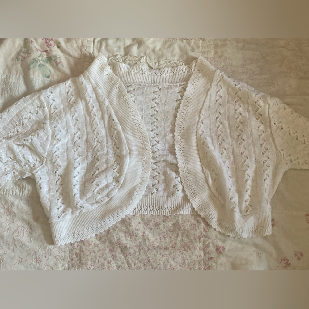 Cream short over cardigan